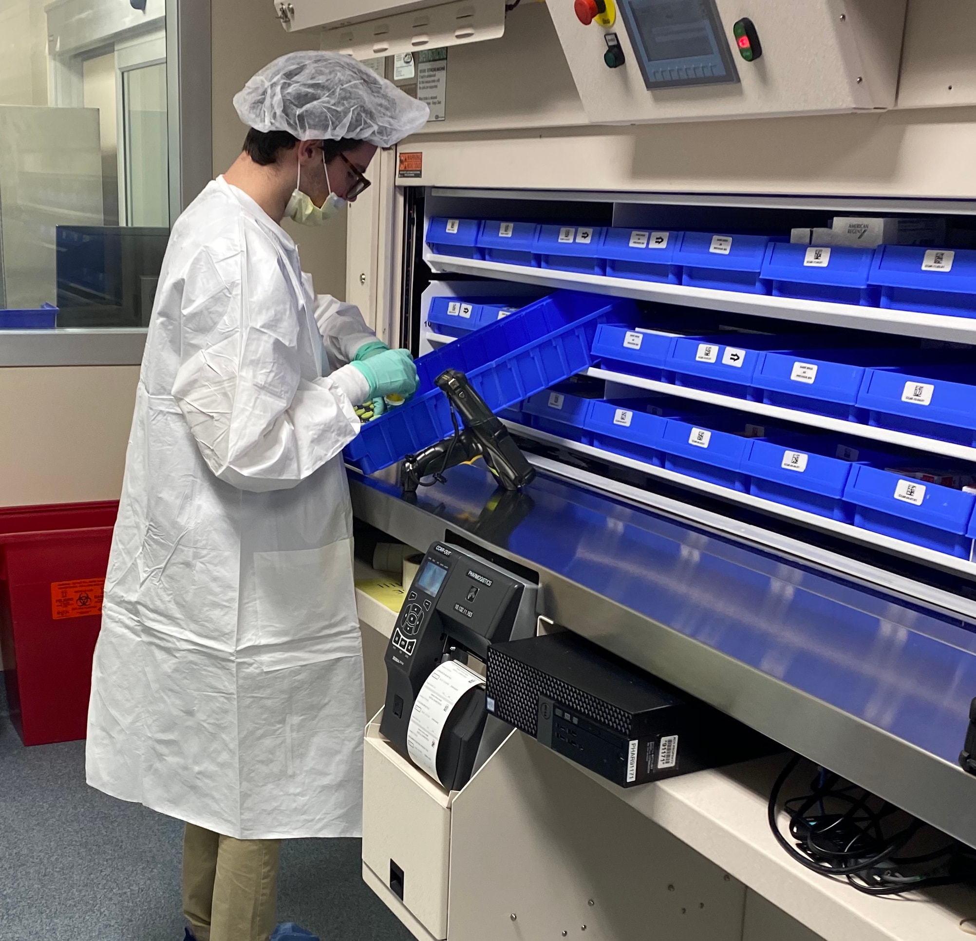 IMC Pharma technician scanning medication barcodes during a hospital pharmacy inventory count
